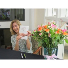 Memory care expert and Licensed Clinical Social Worker (LCSW) Marguerite Manteau-Rao, signs copies of her new book at Lakeside Park memory care community in Oakland, Calif.