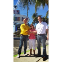 Ibis Bay Resort Owner, Chris Holland with Divers Direct Key West Store Manager, Kelly Rabe and Divers Direct President, Darcy Kieran.