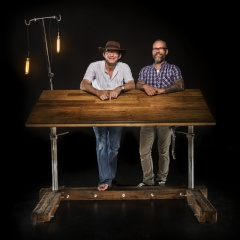 Zoo Studio director, Ken Drake and Custom Industrial founder, Durwin Lambe standing with the Drake Desk.