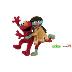 Raya (right) one of the newest members of the Sesame family, along with her friend Elmo (left), will teach children and families about positive health behaviors related to water, sanitation and hygiene.