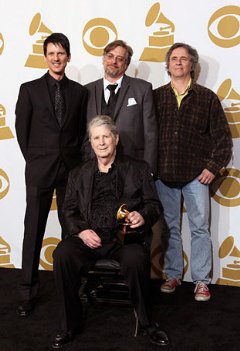 Beach Boys win first-ever Grammy Award.
Clockwise : The Smile Sessions producers Dennis Wolfe, Alan Boyd, Mark Linett, and Brian Wilson