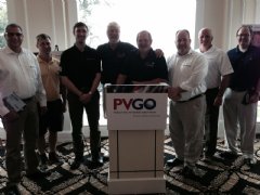 TWI representatives pose with attendees and directors of the Paralyzed Veterans Golf Open.