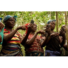 Women conducting community mapping in Democratic Republic of the Congo (Photo courtesy of Leo Bottrill of Moabi)