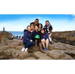 Leading travel writers from China pictured enjoying a visit to the Giants Causeway along with Nuoyi Li, Tourism Ireland China (seated left) and MinLin Siew, guide (seated centre).