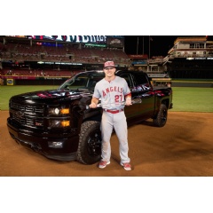 2015 MLB All-Star Game Most Valuable Player Mike Trout of the Los Angeles Angels of Anaheim poses with the MVP trophy and a Chevrolet Silverado Midnight Edition, the prize for his MVP win. (Photo by LG Patterson/MLB Photos via Getty Images)