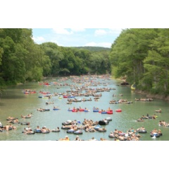 Guadalupe River Tubing on the famous Horseshoe Loop in Canyon Lake, Texas - photo courtesy of the Tube Haus - The Guadalupe River reopens for river tubing on July 2nd, 2015 just in time for the 4th of July weekend.