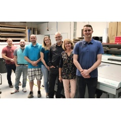 Pictured, left to right, the Signs By Tomorrow Arlington Heights team alongside the Acuity Select 26, Ryan Wagoner, Dmitry Pavlovsky, Jason Pesavent, Alex Looff, Gerd and Jill Looff, and Kevin Looff.