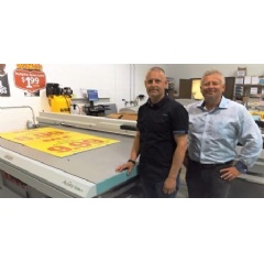 Jeff Huebner, left, and Mike Huebner, alongside Graphicolor’s Acuity Select 26 from Fujifilm.
