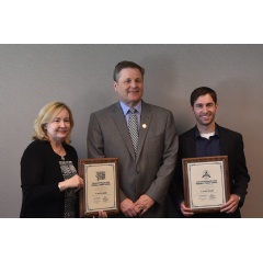 Charlotte Cash, President and CEO, and Chris Shrieves, Youth Financial Coordinator, Accept the Desjardins Financial Education Award