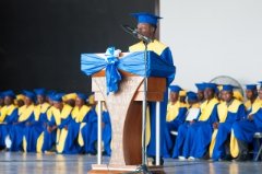 Loubenson Saint-Jean gives the commencement speech during Habitat Haitis training graduation ceremony.