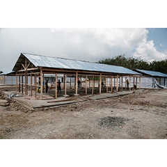 Construction of the first Save the Children Community Care Center for Ebola patients in Margibi County, Liberia. Photo credit: Aubrey Wade/Save the Children.