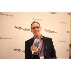 Drawbridge VP of Marketing Brian Ferrario accepts the Tech in Motion Silicon Valley Timmy Award for Silicon Valleys Best Technology Work Culture