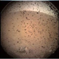 NASAs InSight Mars lander acquired this image of the area in front of the lander using its lander-mounted, Instrument Context Camera (ICC). This image was acquired on Nov. 26, 2018. --Credits: NASA/JPL-CalTech--