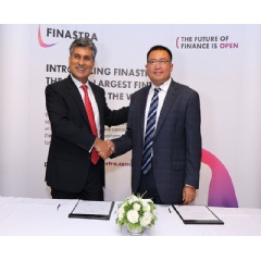 (Left) Anoop Sonpar, Regional Director at Finastra seals the deal with (Right) Mr Win Lwin, Managing Director at KBZ Bank.  -Credit: Finastra-
