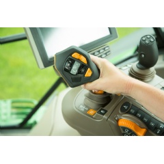 CommandPro is a customizable, ergonomic joystick that can control tractor speed, acceleration and implement functions. -Credit: John Deere-