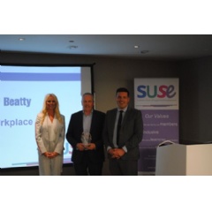 Balfour Beatty receiving award from Jamie Hepburn on behalf of SUSE  -CREDIT: Balfour Beatty-