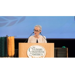 Food activist Liz Neumark speaking to graduates of The Culinary Institute of America at the colleges New York campus on May 24, 2019. (Photo credit: CIA/Phil Mansfield)