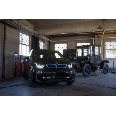 A 2017 BMW i3 electric vehicle and 1914 Detroit Electric Model 47 owned by Thomas Edison and their charging stations inside of Thomas Edisons Glenmont garage at Thomas Edison National Historical Park in West Orange, NJ.