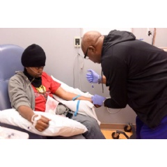 Marqus undergoes a routine doctor examination to treat his sickle cell disease.