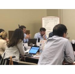 Peer reviewers discuss applications for research grants