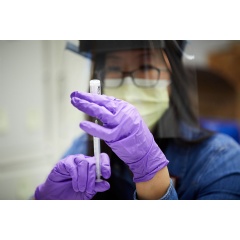 Physician assistant Philana Liang prepares a vial of COVID-19 vaccine on the Washington University Medical Campus. New research from Washington University School of Medicine in St. Louis has found that new variants... (see complete caption below)