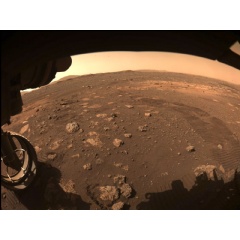 This image was captured while NASAs Perseverance rover drove on Mars for the first time on March 4, 2021. One of Perseverances Hazard Avoidance Cameras (Hazcams) captured this image... (see complete caption below) Credits: NASA/JPL-Caltech