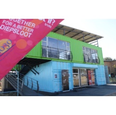 The 244m² eHub was built using converted cargo containers and features a training room, cyber café and reception area on the ground level. Above that is a meeting space, a think tank and a studio for the eHub’s artists in residence, Diepsloot Radio.