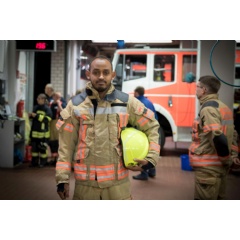 Somali refugee and volunteer firefighter Yusuf, 37, dons his uniform at the fire station in the town of Fürstenwalde, eastern Germany.  © UNHCR/Christian Mang