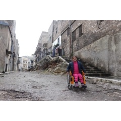© UNICEF/UN0177793/Al-Issa
Hanaa, 8, was paralyzed by an exploding bomb in Aleppo and lost the use of her legs. She now uses a wheelchair. Hanaa had dropped out of school for a year but she returned to continue her education.
