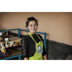Previously stateless, Nazgul Avaz Kyzy, 22, is now a full citizen of Kyrgyzstan and able to work legally at a local caf.   UNHCR/Chris de Bode