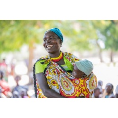 Caption. UNICEF/UN0306323/Abdul
A mother awaiting immunization of their children at Nabilatuk H/C IV, Kaabong District. Uganda
