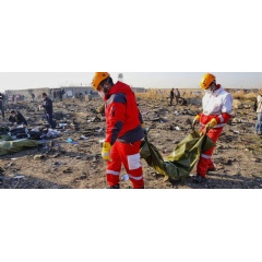 Iranian Red Crescent, and other relief organizations, participate in an operation to transfer dead bodies after a Ukrainian plane crashed in Tehran, Iran.