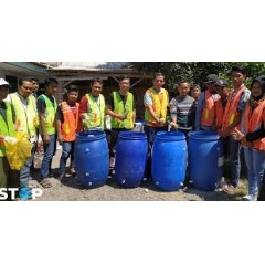 Project STOP team collect plastic waste to be recycled at the waste management facility.