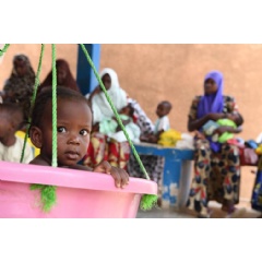 UNICEF/UN0317909/Frank Dejongh
FILE PHOTO: A baby is weighed and measured at a health center in Maradi, Niger.