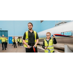 Carl Canova and Suada Dizdarevic cut the ribbon at the inauguration of the primer workshop’s conversion to RME, making it a carbon-neutral paint workshop.