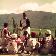 Roberto Clemente working off-season with kids in Carolina, Puerto Rico, 1962.Courtesy of The Clemente Museum.