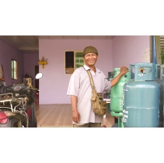 Apicha Chumchan, is the owner of small cooking gas shop. The loan fulfilled his dream to open a small business after being a worker for many years.