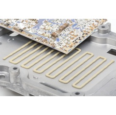 Thermally conductive silicone gap fillers from WACKER optimize the thermal transport between an electronic circuit that becomes hot during operation and the heat sink.(see complete caption below)