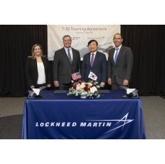 Aimee Burnett, Greg Ulmer and OJ Sanchez join Mr. Hyun-Ho Ahn, president & CEO, Korea Aerospace Industries, for the T-50 Teaming Agreement signing ceremony.