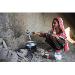 UNICEF/UN0730544/Bashir. On 3 November 2022 in Jacobabad, Sindh province, Pakistan, 15-year-old Sugrah collects water. Her home was destroyed in the recent floods in one of the worst-affected areas.