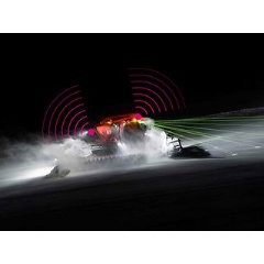 No UFO or Alien but a Kssbohrer Pistenbully.  Kssbohrer / Deutsche Telekom