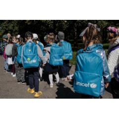 UNICEF and U.S. CDC/UN0715429/Strek
Children attending a school for Ukrainian refugees walk in a park in Krakow, Poland.