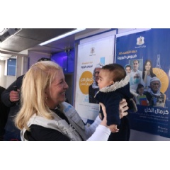 UNICEF/UN0795024/Deeb
On 1 March 2023 in in Aleppo, Syria, UNICEF Executive Director Catherine Russell holds a child while visiting Ahmad Adeeb Al-Ali School (“The School Shelter”),(see complete caption below)
