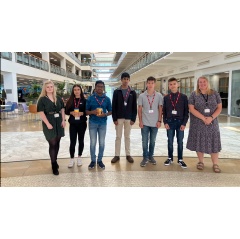 Year 10 and 11 students and their site lead at Avivas Technology Work Placement in Bristol