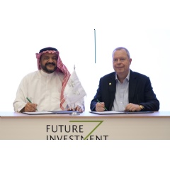 Aramco Executive Vice President of Technology & Innovation, Ahmad O. Al Khowaiter, left, and ENOWA Chief Executive Officer Peter Terium, right, during the signing which took place at the seventh edition (see complete caption below)