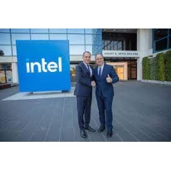 Cedrik Neike, CEO of Digital Industries and board member for Siemens AG and Keyvan Esfarjani, chief global operations officer for Intel Corp. pose for a photo to mark the signing of a memorandum of understanding (see complete caption below)
