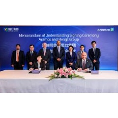 Pictured at the MoU signing are Janet Kong, Hengli Petrochemical International Pte. Ltd. CEO, sitting left, and Saleh Al Zaid, Aramco Asia Acting President, sitting right. (see complete caption below).