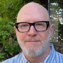 Scholastics David Saylor and Amulet Author Kibuishi Talk to The 74 about Kids Reading