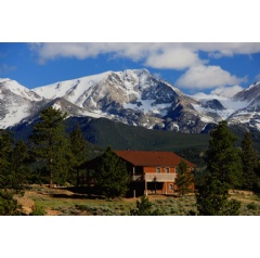 Situated on 800+ acres bordering Rocky Mountain National Park, YMCA of the Rockies in Estes Park features pet-friendly private cabins starting at $109/night and hotel-style lodge rooms for $84/night.