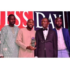 Ade Sun-Basorun, CEO Designate, FoodCo Nigerian Ltd (second from left) and Frank Aigbogun, Publisher, BusinessDay Media Ltd, (second from right) flanked by FoodCo team during the 2019 NBL awards